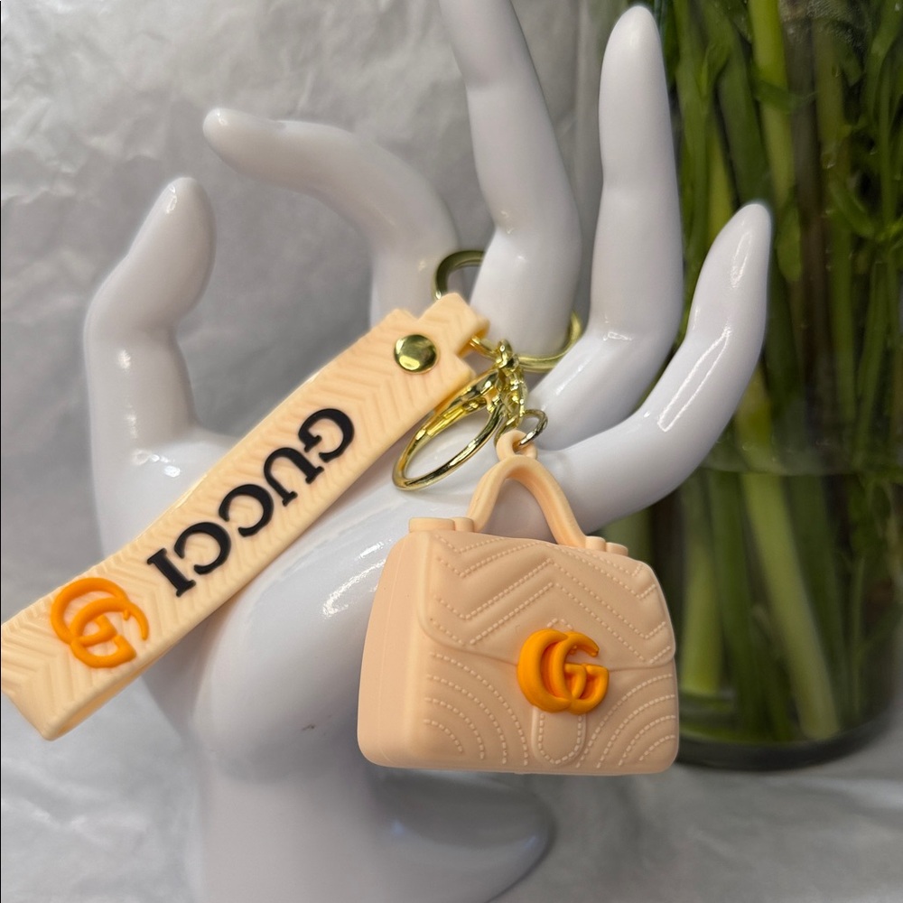 Cream Color Mini Bag Keychain with Orange GG Charm